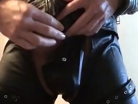 Horny Guy in leather jerking